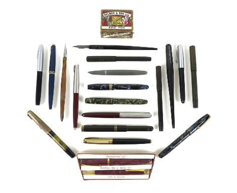 A collection of vintage fountain pens, including a Brenna with 14ct gold nib which extends out through the hinged end of the 