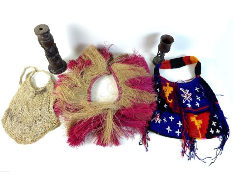 A group of ethnographic and tribal items comprising an initiation skirt from the Trobriand Islands, two Papua New Guinea hand