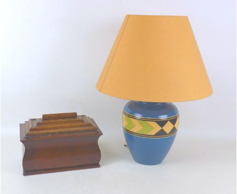 A late 20th century table lamp, with ceramic base, indistinctly signed, lamp base 18 by 25cm high, with shade 41 by 51cm high