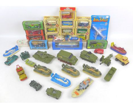 A collection of Dinky Toys army vehicles and and other die-cast toy vehicles, including Dinky Toys Chieftan Tank, Alvis Scorp