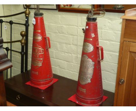 Two vintage No. 2 Invincible fire extinguishers