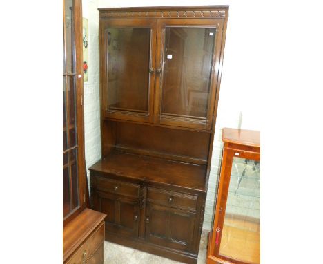 Ercol elm glazed door top cabinet