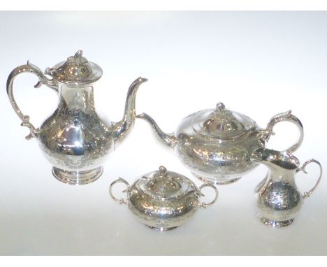 Silver plated four piece tea and coffee service with scrolling foliage decoration