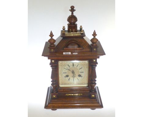 Mahogany striking mantel clock with silvered dial