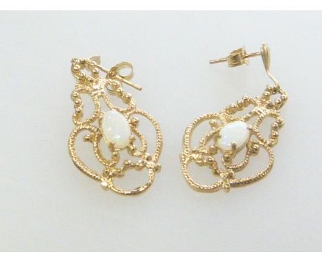 Pair of 9ct gold and opal earrings