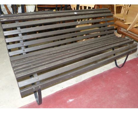 Wrought iron and stained wood garden bench