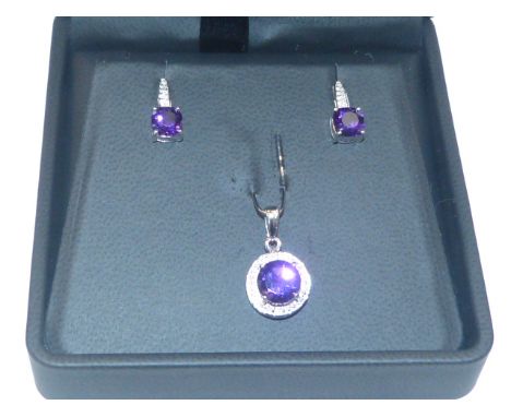 Suite of amethyst and diamond jewellery comprising pendant and a pair of earrings, mounted in 9ct gold