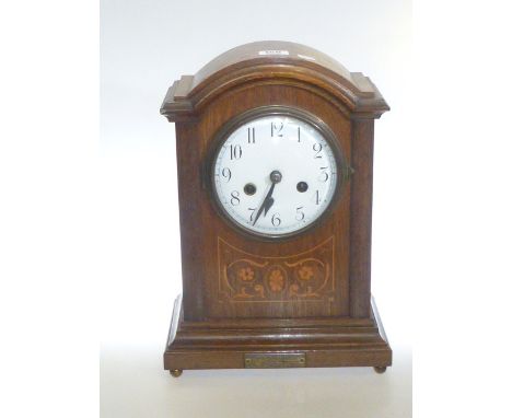 Edwardian oak and satinwood inlay arch top mantel clock with enamel dial