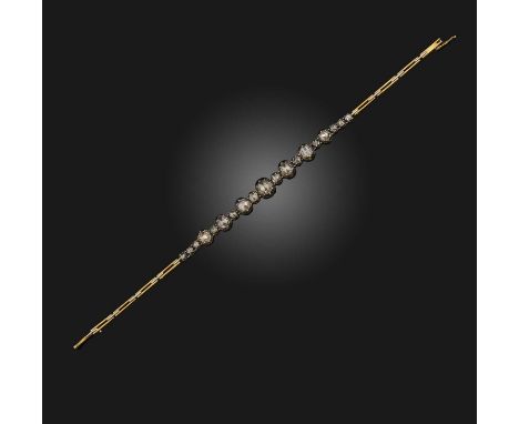 A rose-cut diamond bracelet, set with graduated rose-cut diamonds in silver collets and a gold bracelet, length 18cm