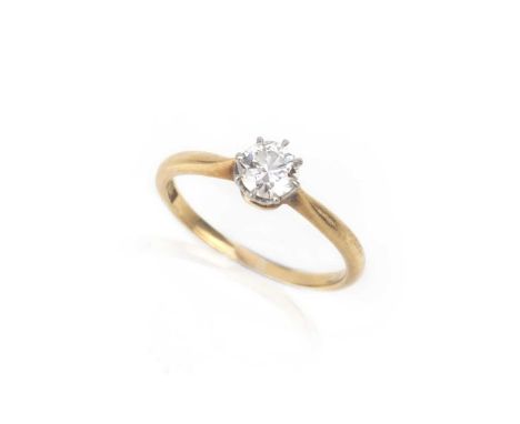 A diamond solitaire ring, early 20th century, claw-set with a circular-cut diamond weighing approximately 0.35 carats, mounte