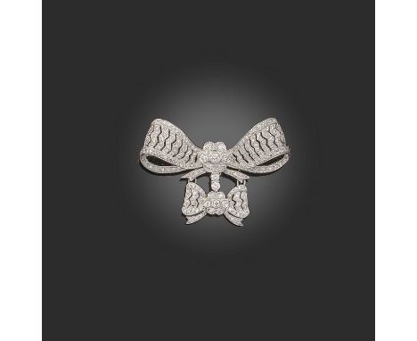 A diamond brooch, of Edwardian inspiration, designed as one openwork ribbon bow suspending a smaller detachable ribbon bow pe