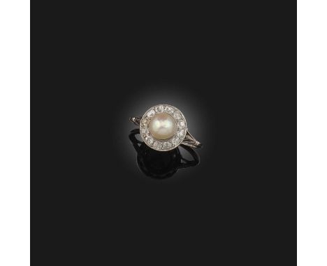 A natural pearl and diamond ring, early 20th century, designed as a cluster, set with a natural pearl measuring approximately