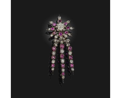 A Victorian ruby and diamond brooch, late 19th century, designed as a star suspending three pampille pendants, set with cushi