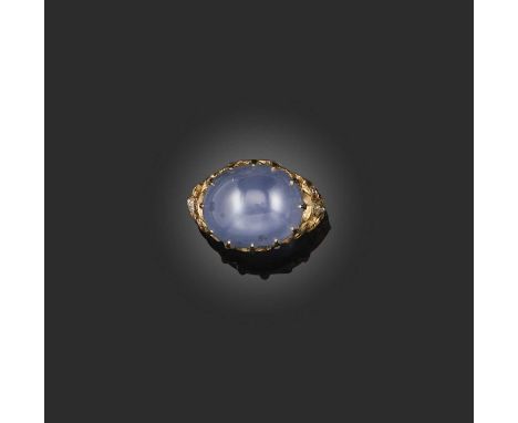 A star sapphire and diamond ring, set with a pale blue cabochon sapphire in cushion-shaped and rose-cut diamond yellow gold s