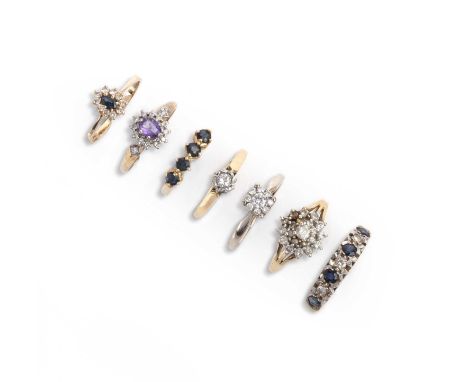 A collection of seven rings, comprising: two diamond cluster rings in 9ct gold, sizes L1/2 and O1/2 (shank split), each with 