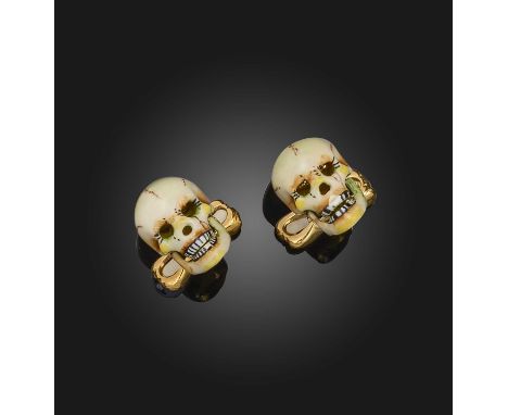 Deakin &amp; Francis, a pair of gold and enamel cufflinks, each designed as a skull applied with multicoloured enamel, to hin