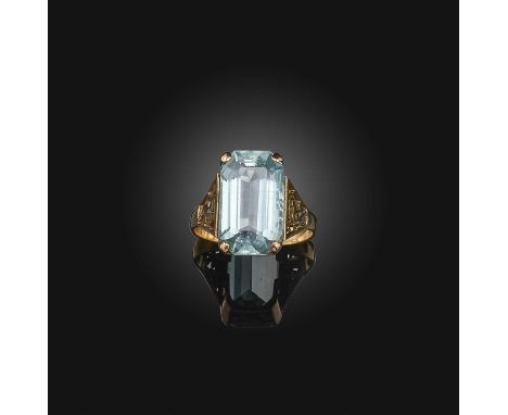 An aquamarine ring, mid 20th century, claw-set with a step-cut aquamarine weighing approximately 7.00 carats, to pierced shou
