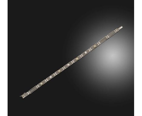 An Art Deco half pearl and diamond bracelet, 1920s, composed of platinum gate linking set with half pearls and circular-cut d