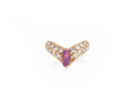 A star ruby and diamond ring, of wishbone design, set with a cabochon star ruby, to a band pavé-set with brilliant-cut diamon