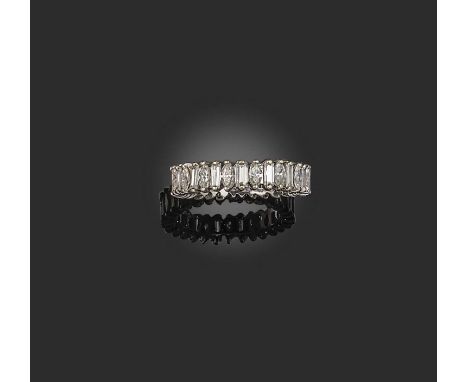 A diamond eternity ring, designed as a continuous band of marquise-shaped and baguette diamonds, set in alternation, mounted 