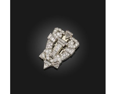 An Art Deco diamond clip brooch, 1930s, of shield-shaped design, pavé-set with brilliant-cut diamonds and collet-set with geo