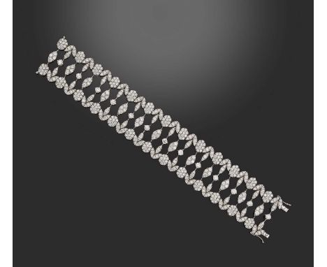 A diamond strap bracelet, set with graduated round brilliant-cut diamonds in openwork white gold setting, total approximate d