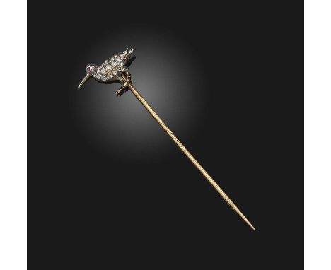 A late 19th century diamond-set stickpin, in the form of a woodcock pave-set with diamonds and a ruby eye in silver and gold,