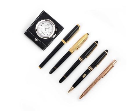 No reserve - Mont Blanc and Cartier, a collection of writing accessories and a travel clock, comprising: three pens and one p