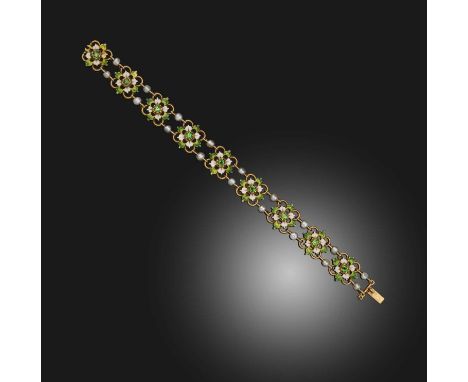 A Renaissance revival demantoid garnet, pearl and enamel bracelet, late 19th century, composed of stylised floral links set w