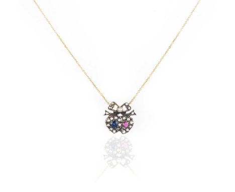 A sapphire and ruby heart necklace, set with an oval-shaped sapphire and ruby within diamond surround beneath a diamond-set b