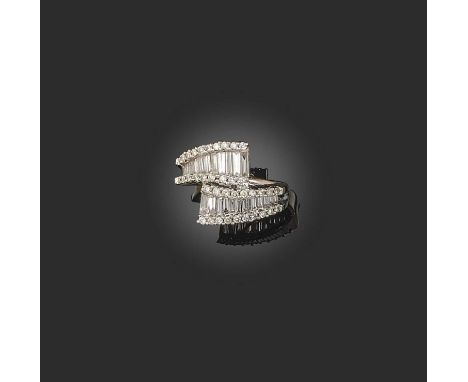No reserve - a diamond ring, of crossover design, set with brilliant-cut and baguette diamonds totalling approximately 1.25 c