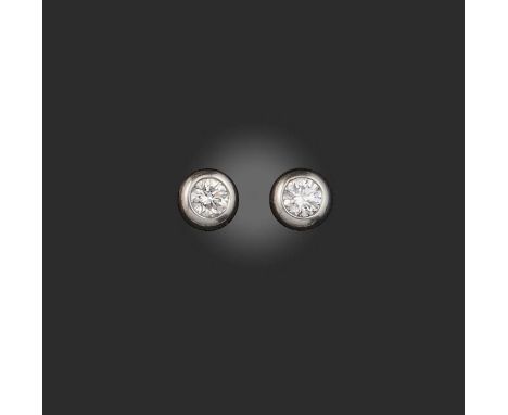 A pair of diamond stud earrings, each collet-set with a brilliant-cut diamond weighing approximately 0.40 carats, mounted in 