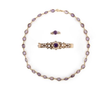 A group of amethyst jewels, comprising: an amethyst and seed pearl bangle in 9ct gold, inner circumference 18cm, British hall
