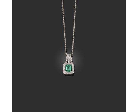 Amoro, an emerald and diamond cluster pendant, the step-cut emerald set within a surround of circular-cut diamonds and a diam