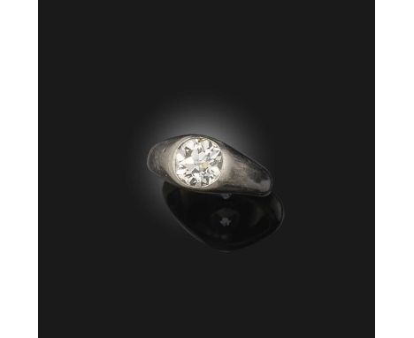 A diamond solitaire ring, rubover-set with a circular-cut diamond weighing approximately 1.00 carat, to a plain platinum moun