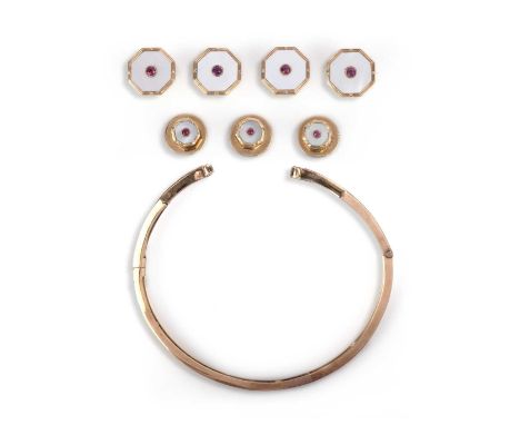 A mother of pearl and ruby dress set, and a gold bangle, the dress set comprising four buttons and three studs, each of octag