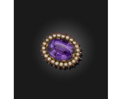 A Victorian amethyst, pearl and ruby brooch, mid 19th century, set with an oval amethyst within a border of half pearls and c