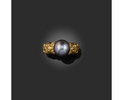 A cultured pearl ring, set with a black cultured pearl measuring 9.3mm, to a gold mount of scrolled design, size L1/2, signed