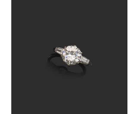 A diamond ring, set with a brilliant-cut diamond weighing 2.39cts, between shoulders set with baguette diamonds, mounted in p