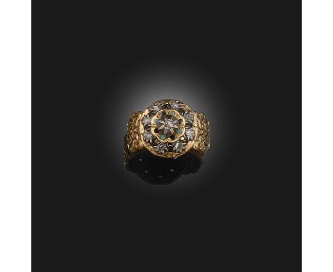 A diamond ring, designed as a cluster of rose-cut diamonds in silver collet settings, accented with blue enamel, to a gold ba