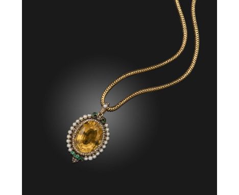 A citrine, emerald, pearl and diamond pendant, France, late 19th century, designed as an oval citrine within a border of rose