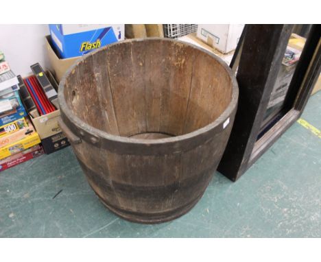 Metal bound wooden barrel planter