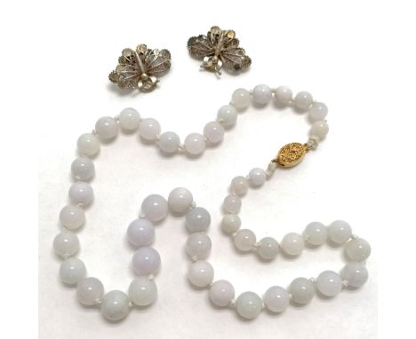 Lavender jade graduated bead necklace 44cm long T/W a pair of silver filigree butterfly clip on earrings Condition reportIn g