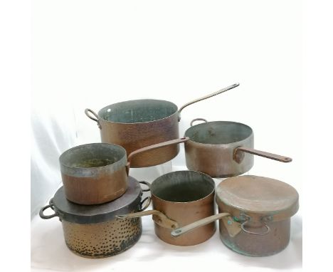 6 large antique copper saucepans with 2 lids. Largest 36cm diameter x 20cm high Condition reportsmallest has old patch repair