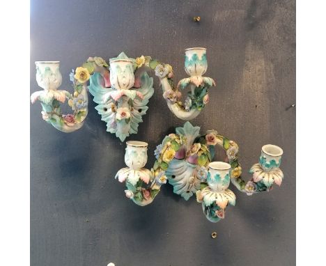 Pair of Antique ceramic Ernst Bohne &amp; Sohne candle sconces with floral encrusted decoration. Bearing a blue anchor mark a
