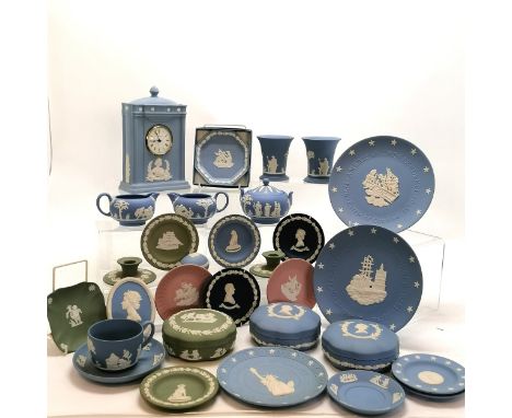 Qty of Wedgwood including a clock, cup and saucer, pair of jugs, pair of vases, 3 lidded pots, sugar bowl, plates, pin dishes