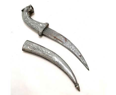 Eastern silver Niello work dagger and sheath with lions head handle &amp; damascene blade with script to one side. 23cm long 