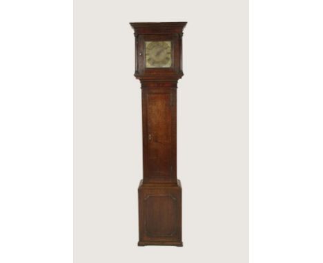 AN OAK LONGCASE CLOCK with a brass dial signed 'Tho. Vernon, Ludlow' with single handed thirty hour movement, striking on a b