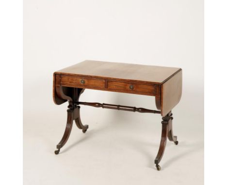 A REGENCY MAHOGANY AND ROSEWOOD CROSSBANDED SOFA TABLE, the rectangular top with drop flap ends above two frieze drawers and 