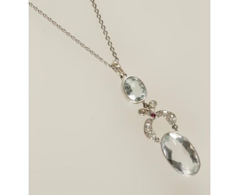 AN AQUAMARINE AND DIAMOND PENDANT, formed from an oval-cut collet-set aquamarine, suspending a diamond-set curved stylised li